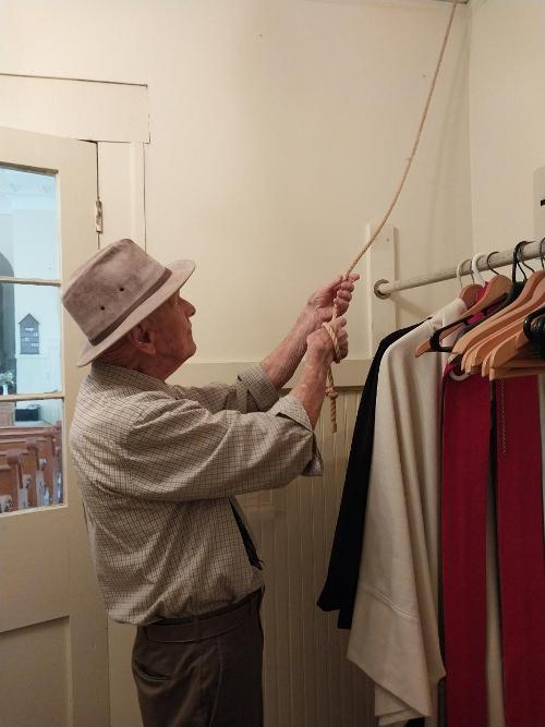 Richard Ballou Ringing the Bell Before Church Service